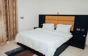 Desk, laptop workspace, blackout drapes, iron/ironing board - La Classe Hotel (Kamembe)