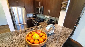 Fridge, oven, dishwasher, coffee/tea maker