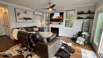 Smart TV, fireplace, table football, books