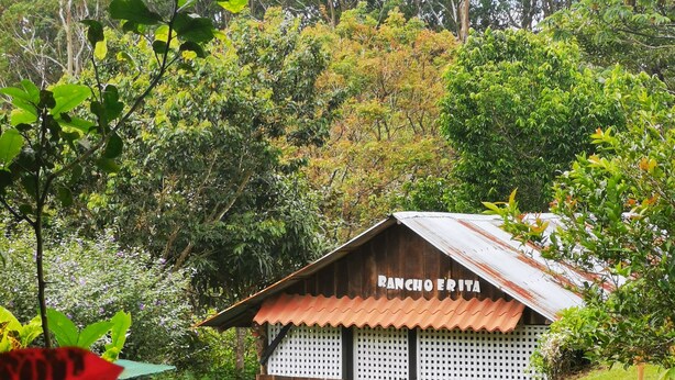A rustic wooden building with a corrugated metal roof labeled "RANCHO ERITA." - Complete Cabin and Mountain Farm (San Ramon)
