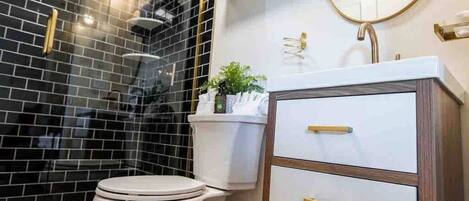 Shower, hair dryer, soap, shampoo