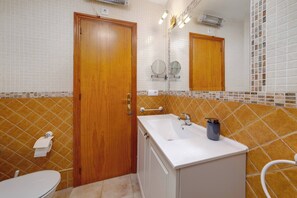 Shower, hair dryer, soap, shampoo