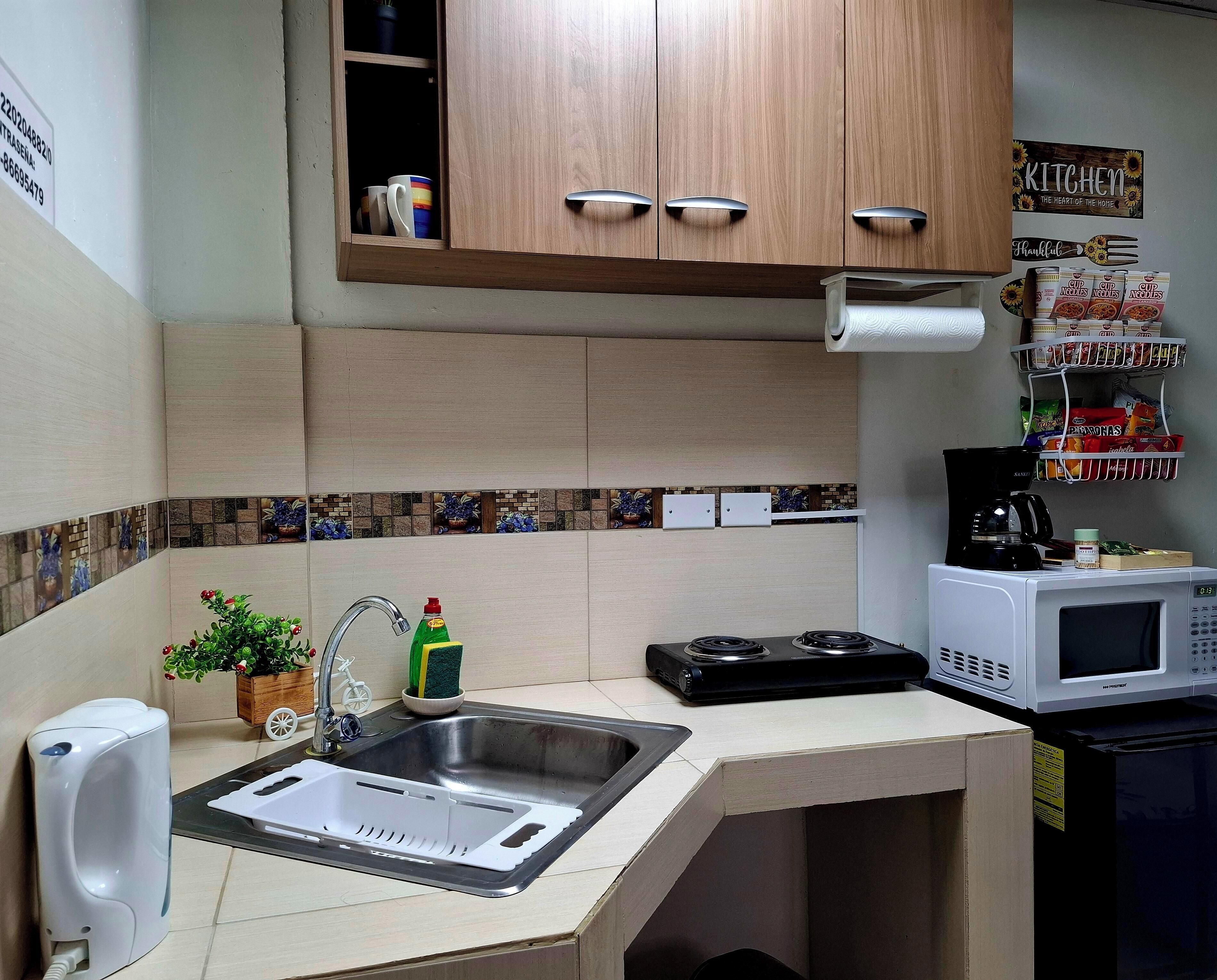 Fridge, microwave, coffee/tea maker, electric kettle