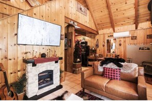 Living area - Pops Bear Cabin W/Outdoor Pub, Firepit W/Swing Chairs, BBQ, Games & More. (Big Bear)
