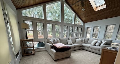 Quaint Cape Cod attached home nestled atop a hill near Speedwell Forge Lake