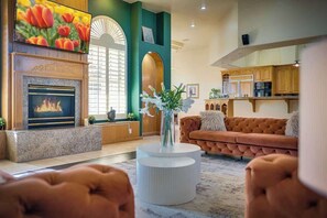 Smart TV, fireplace, table football, books