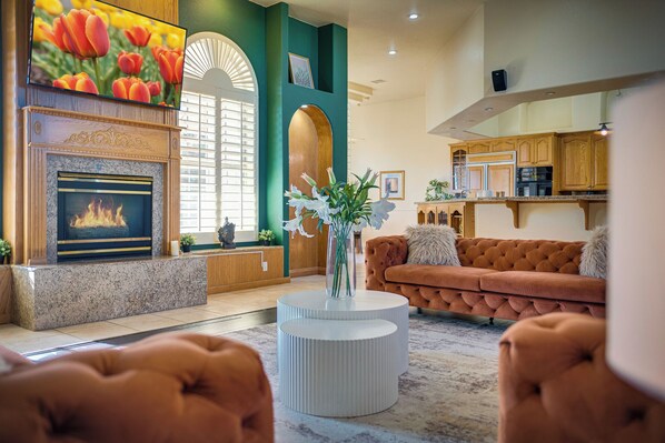 Smart TV, fireplace, table football, books