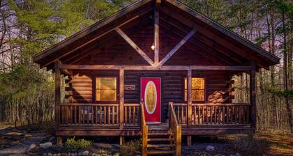Quaint cabin nestled in the pines.