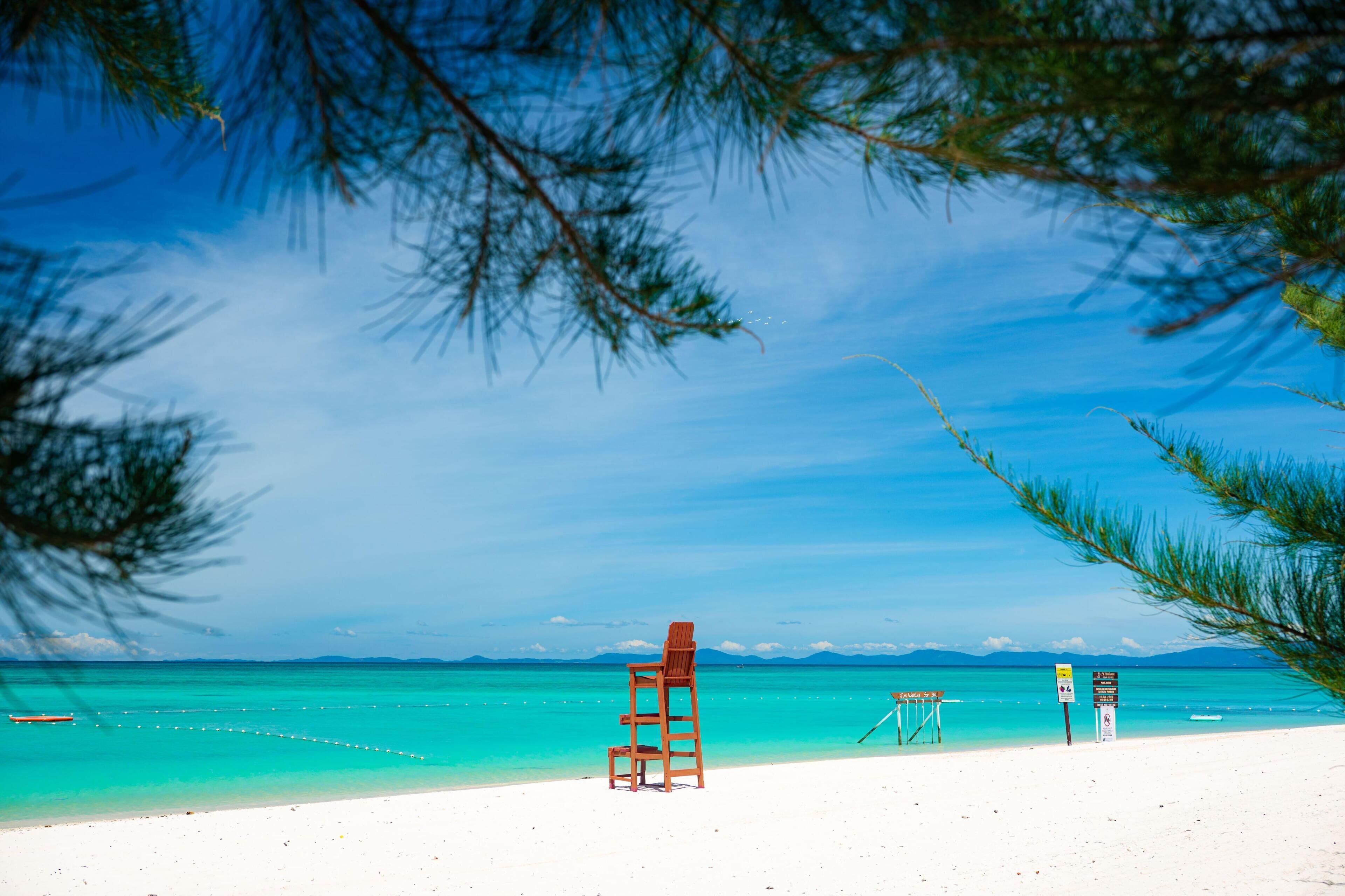 On the beach, white sand, free beach cabanas, sun-loungers