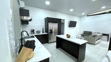 Fridge, microwave, stovetop, coffee/tea maker