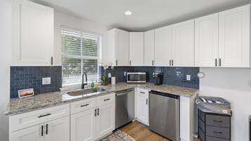 Fridge, microwave, dishwasher, coffee/tea maker