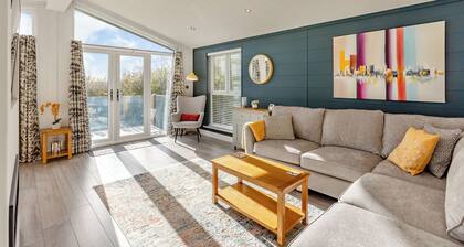 Luxurious lodge with vaulted ceilings and a welcoming feature fireplace.