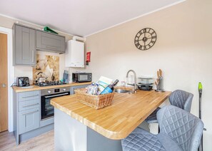 Refrigerador, horno, parrilla de estufa y tostadora 