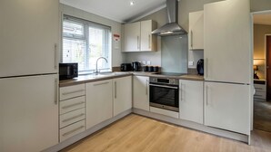 Oven, stovetop, toaster, highchair - 1 bedroom accommodation in Raywell, Beverley (Raywell, Beverley)