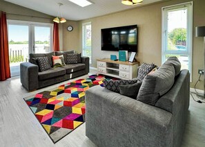 Living area - This deluxe two bedroom lodge even has its own games den. (Raywell, Beverley)