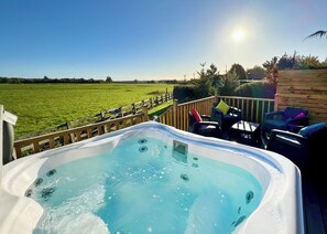 Outdoor spa tub - This deluxe two bedroom lodge even has its own games den. (Raywell, Beverley)
