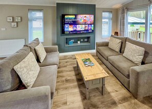 Living area - Upgraded for 2025 – Now with Air Hockey/Pool/Table Tennis Combo and Dartboard. (Raywell, Beverley)