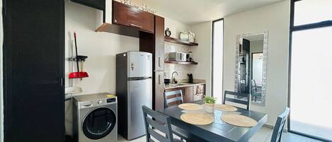 Fridge, microwave, stovetop, coffee/tea maker