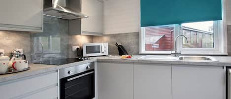 Refrigerador, horno, parrilla de estufa y tostadora