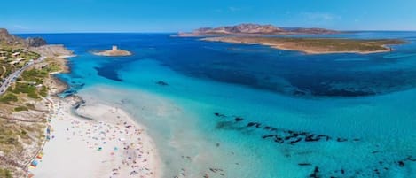 Una spiaggia nelle vicinanze, teli da spiaggia