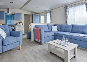 Living area - New in 2020 - 12ft wide caravan with one double, two twin. (Swanage)