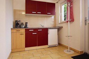 Fridge, stovetop, coffee/tea maker, toaster