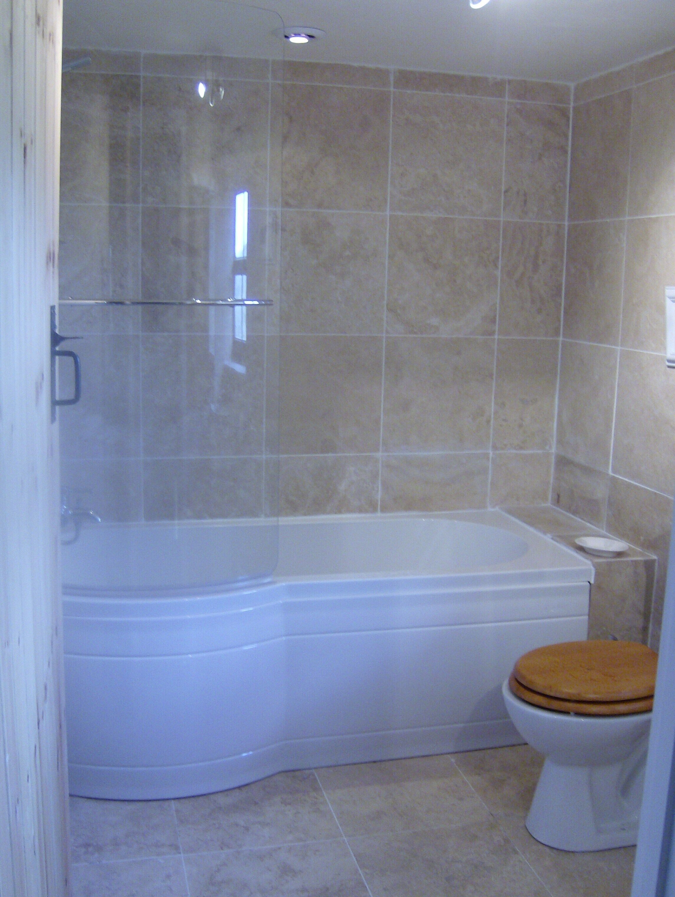 Shower, hair dryer, towels, toilet paper