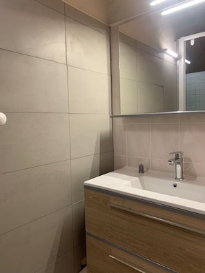 Ducha, secador de pelo