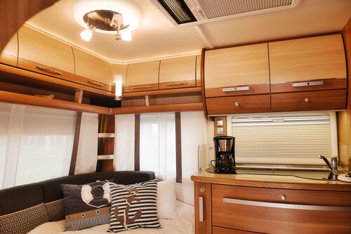 Chic caravan with awning on the Baltic Sea in Dierhagen