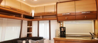 Chic caravan with awning on the Baltic Sea in Dierhagen