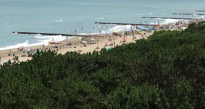 Appartement de vacances avec service de plage et climatisation