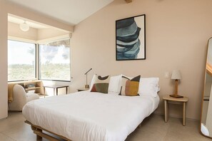 1 habitación, tabla de planchar con plancha, cuna de viaje y wifi 