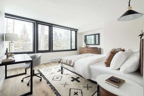 1 bedroom, desk, iron/ironing board, travel crib