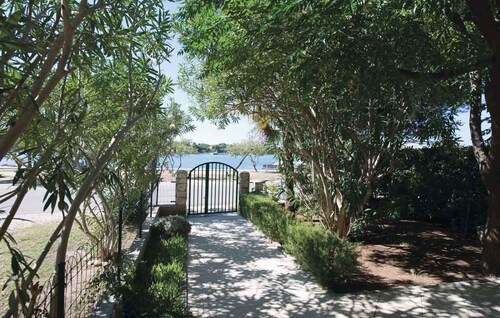 Holiday home with three bedrooms in Sukošan