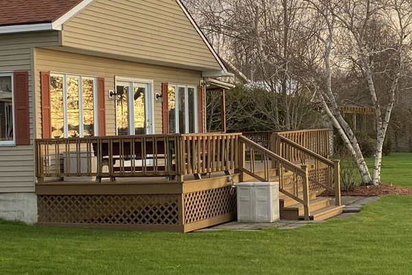 Enjoy the view from the deck overlooking Lake Ontario