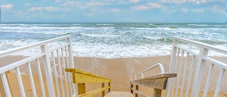On the beach, sun loungers, beach towels