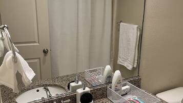 Hair dryer, towels, soap, shampoo