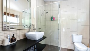 Bathtub, hair dryer, towels