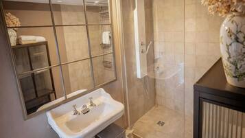 Combined shower/bathtub