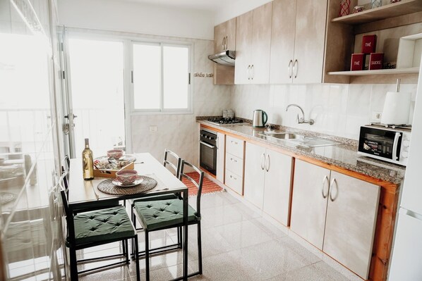 Fridge, microwave, oven, coffee/tea maker