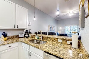 Fridge, microwave, oven, high chair