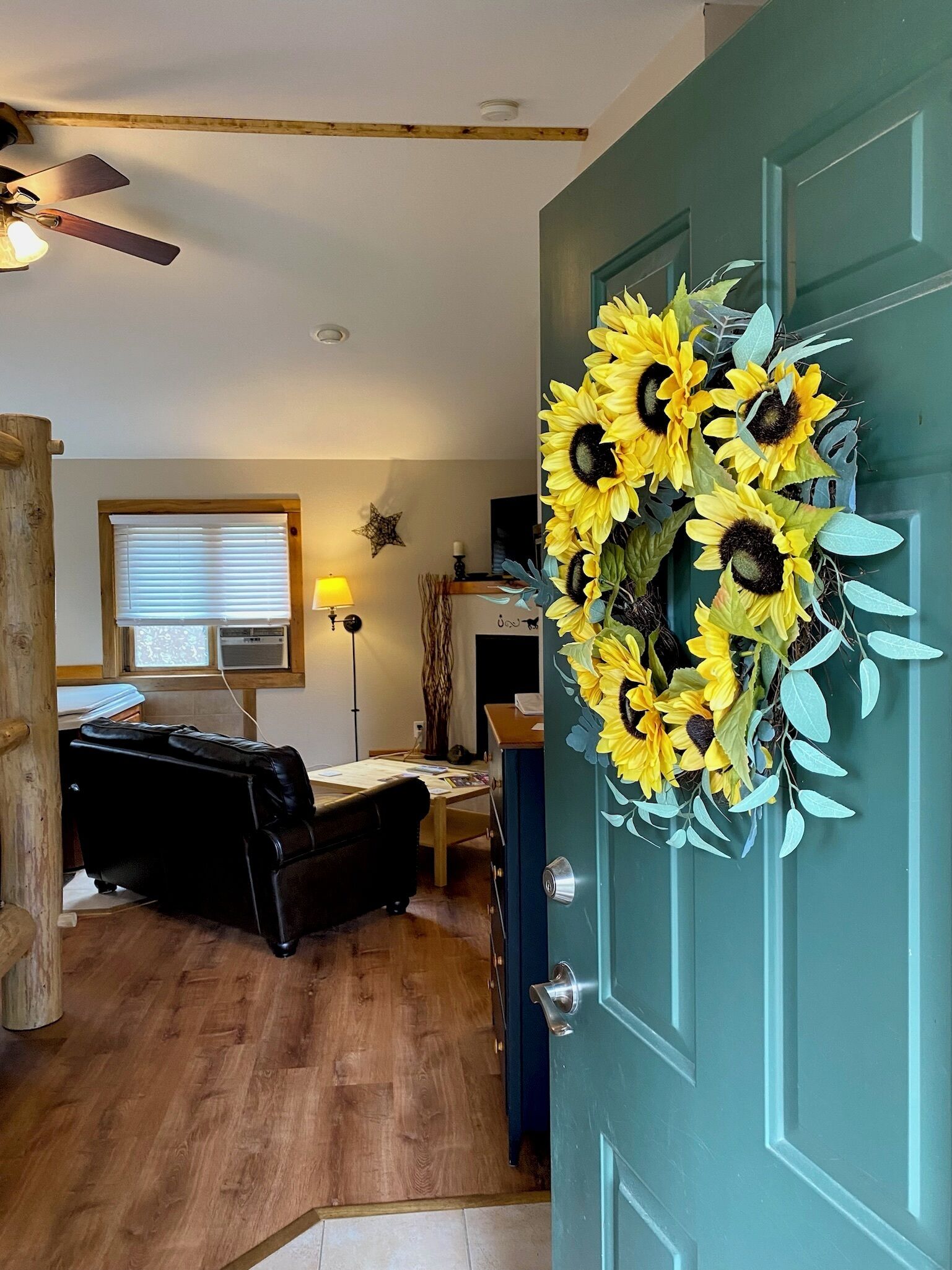Romantic Cabin | Living area | 36-inch LED TV with cable channels, fireplace, DVD player