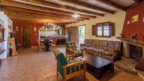 TV, fireplace - Casa del Río Canillas de Aceituno by Ruralidays (Málaga)