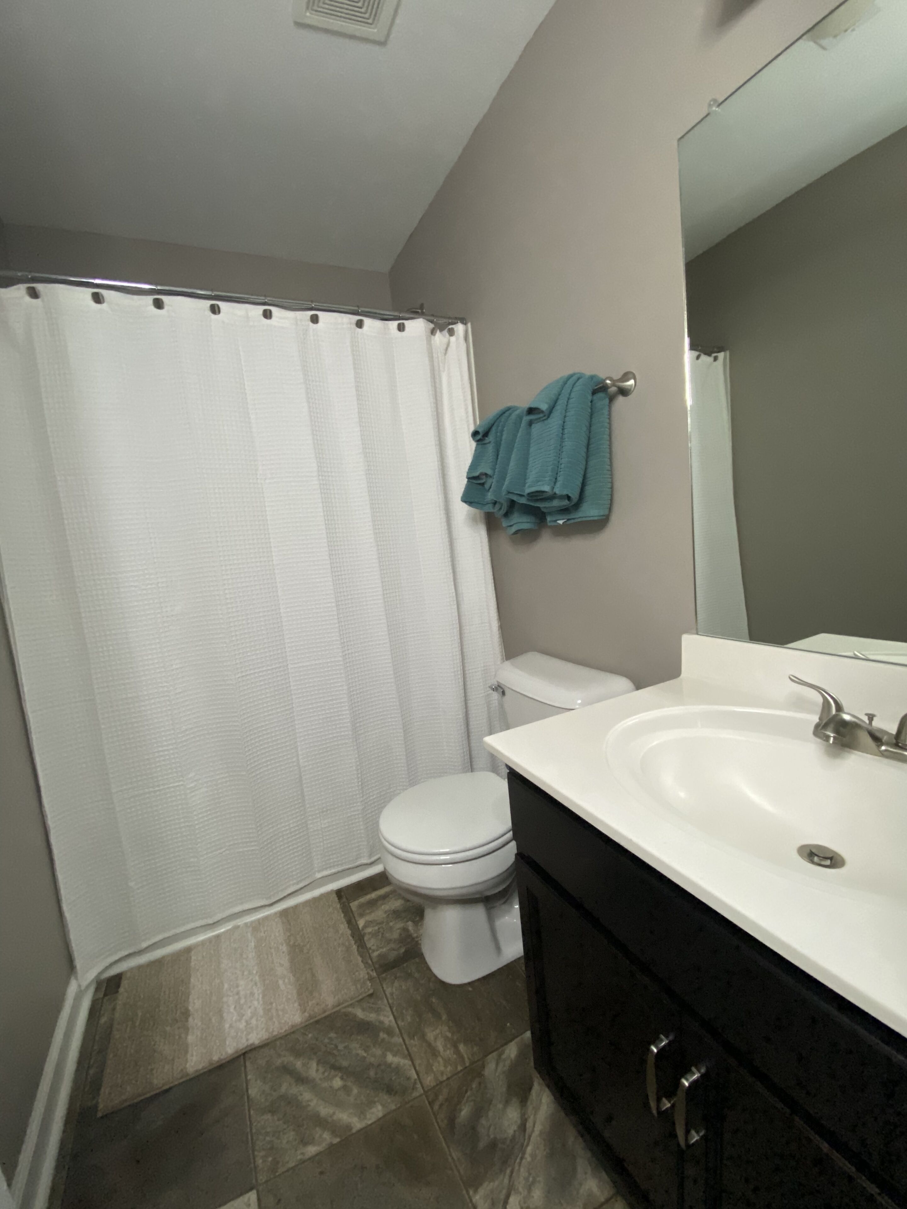 Guest bathroom that is attached to the guest bedroom