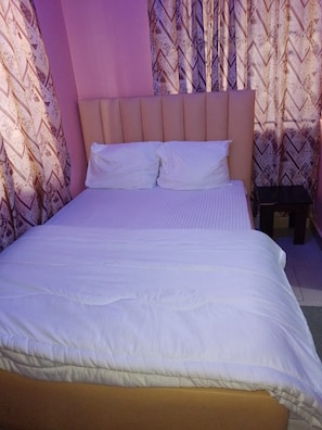Standard Room | Egyptian cotton sheets, premium bedding, memory foam beds, desk - Americana Hotel (Lagos)