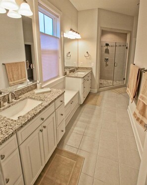 A bathroom with two sinks, a shower, and a towel rack. - Coastal Club * 4BR Luxury House (Lewes)