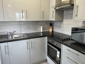 Appartement, plusieurs lits | Cuisine privée