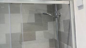 Studio, 1 Queen Bed with Sofa bed | Bathroom | Shower, towels