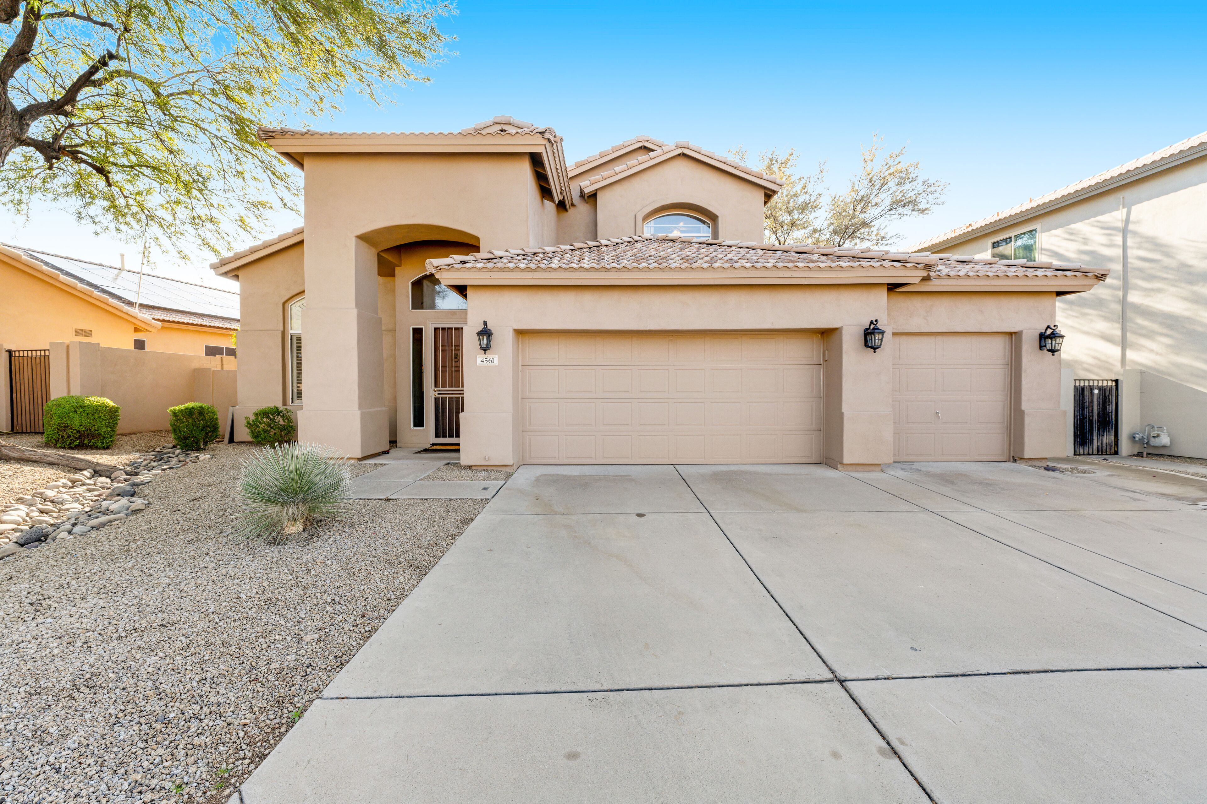 Private pool home with walled yard, firepit, grill & lanai - dog-friendly