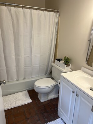 Hair dryer, towels, soap, shampoo